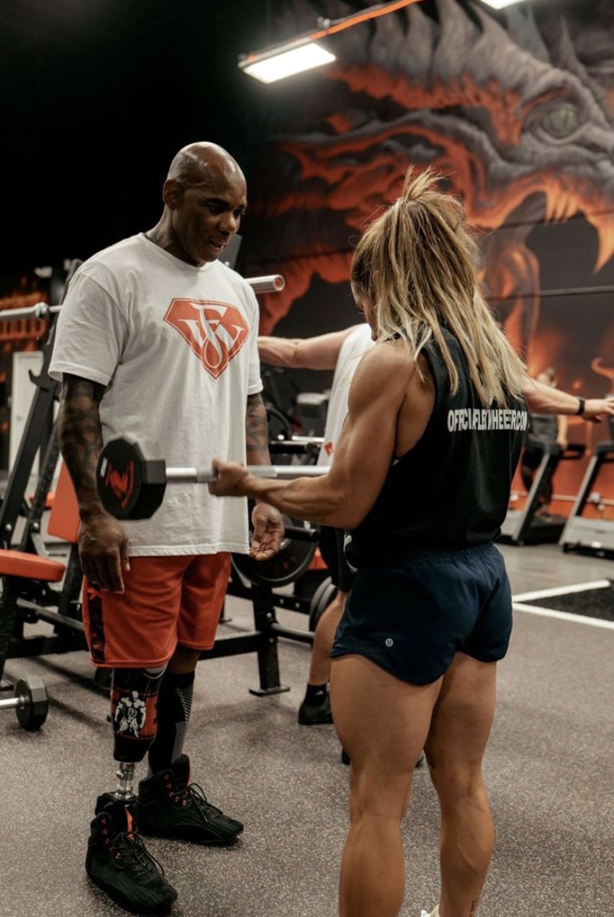 Coach Flex Wheeler in the gym