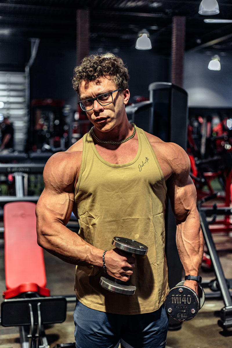 The coach is working out at the gym.