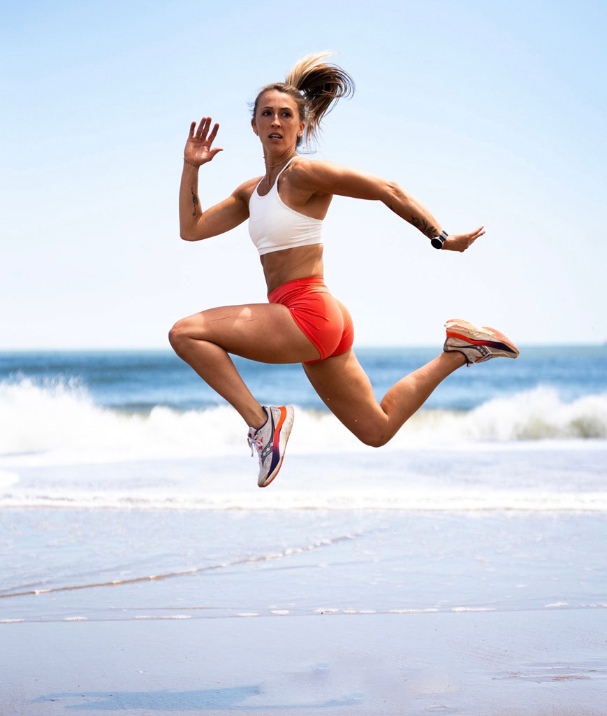 An image of the coach jumping