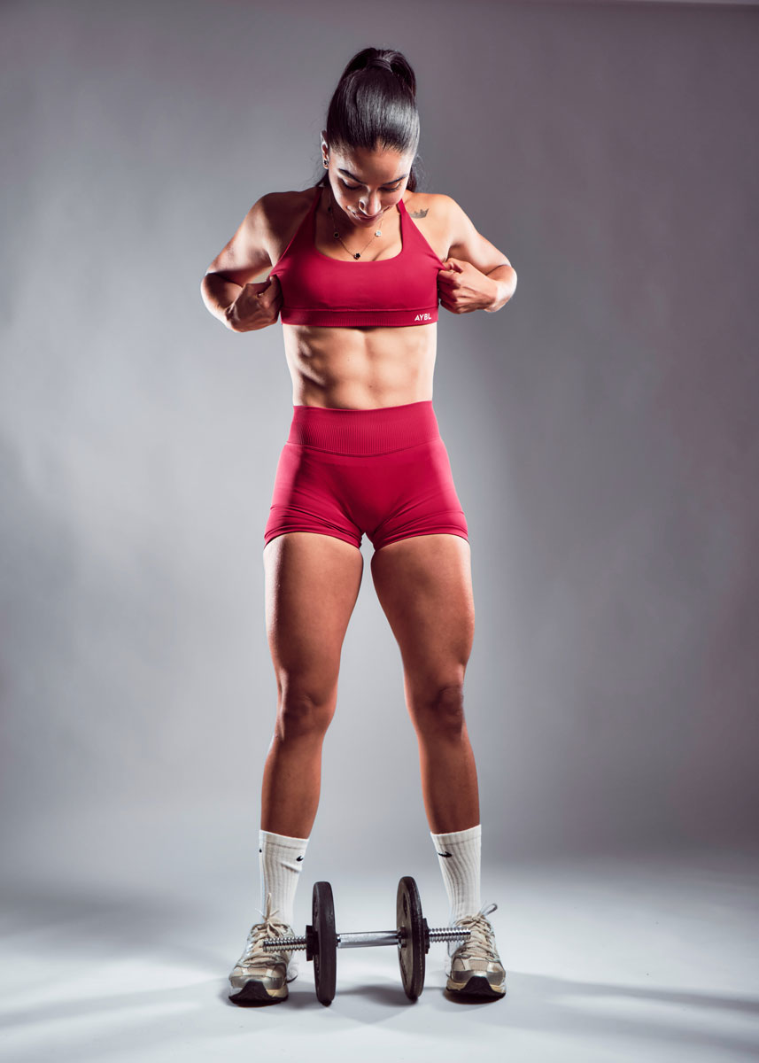 The coach is showing her muscle.