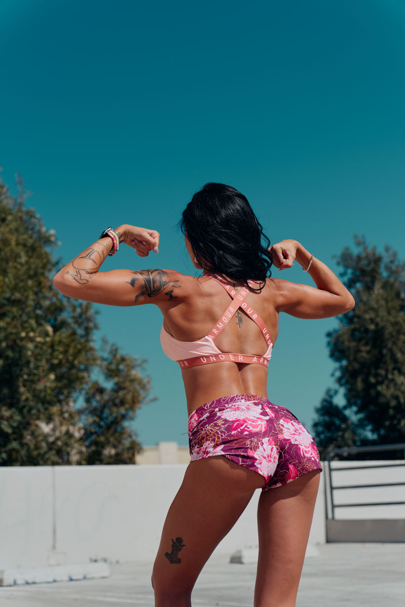 The coach is showing her apple hip.
