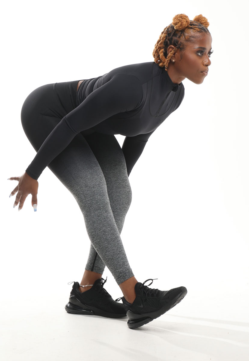 The coach is posing to run.